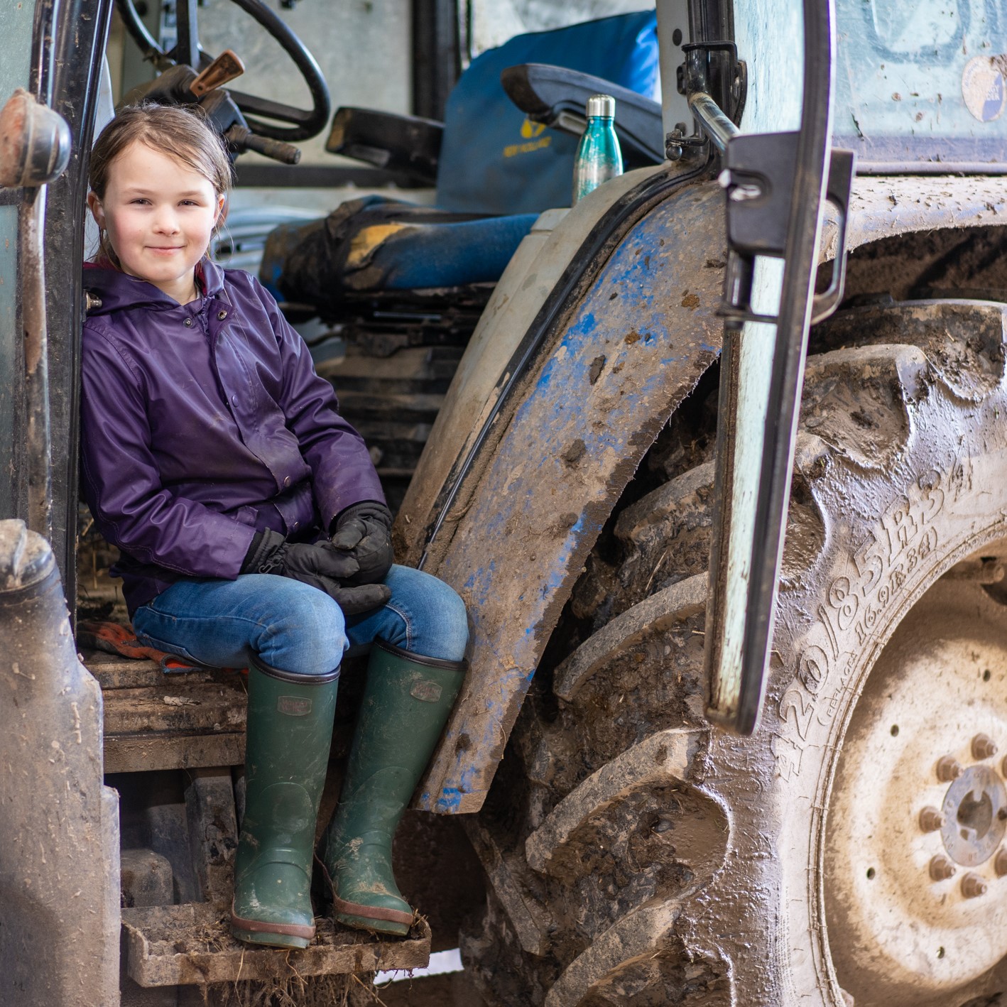 girl on a tractor